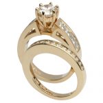 Elegant Yellow Gold Wedding Set with Channel-Set Sides.